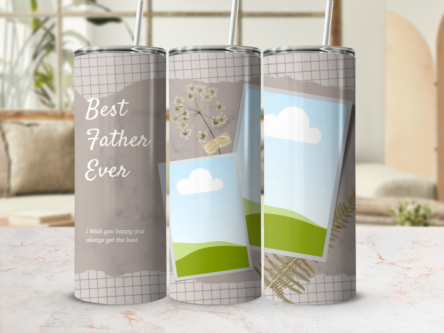 Tumbler with "Best Father Ever" text, torn paper, photos, and dried flowers.