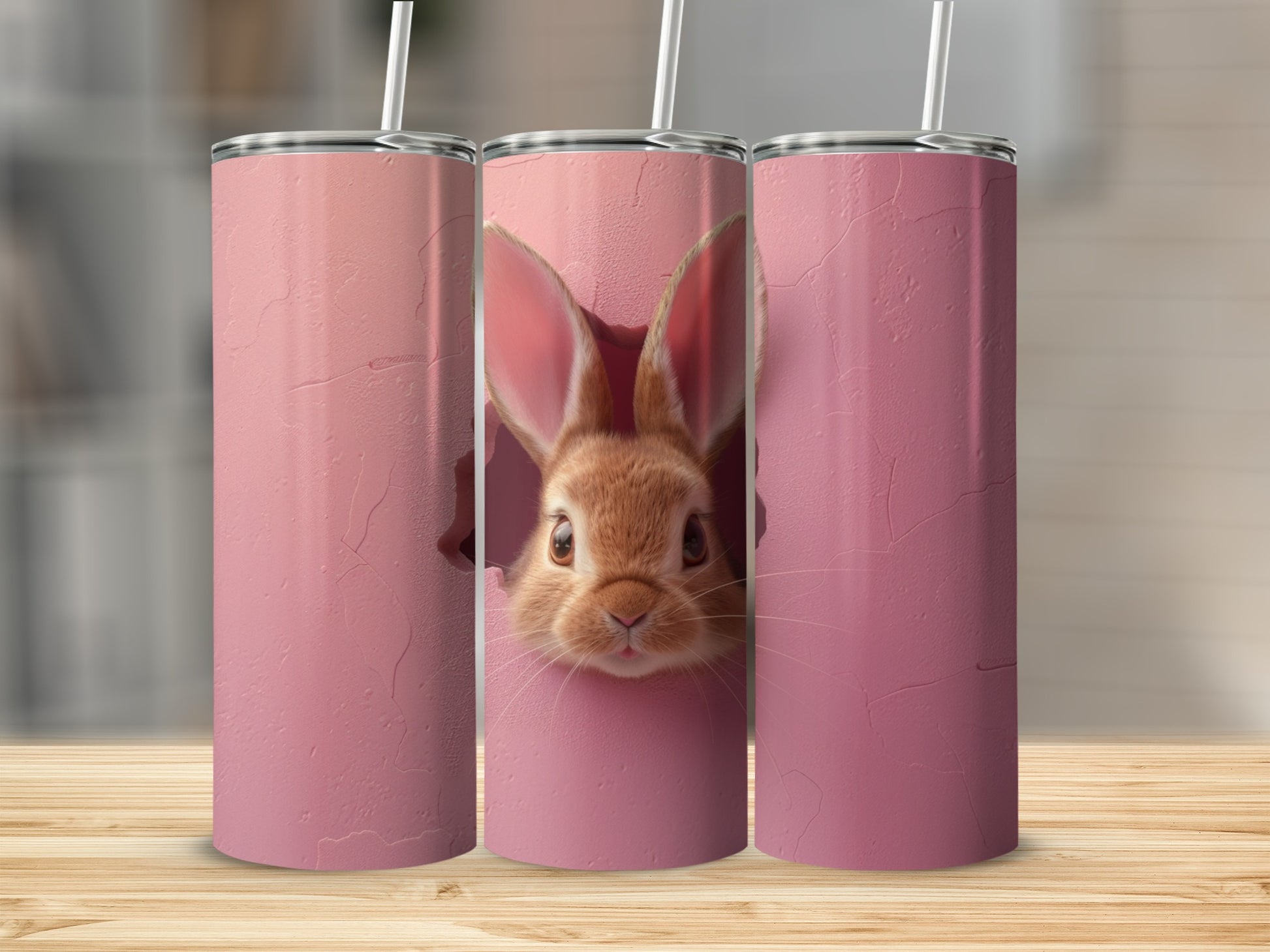 Pink tumbler with a cute bunny peeking out of a cracked eggshell.