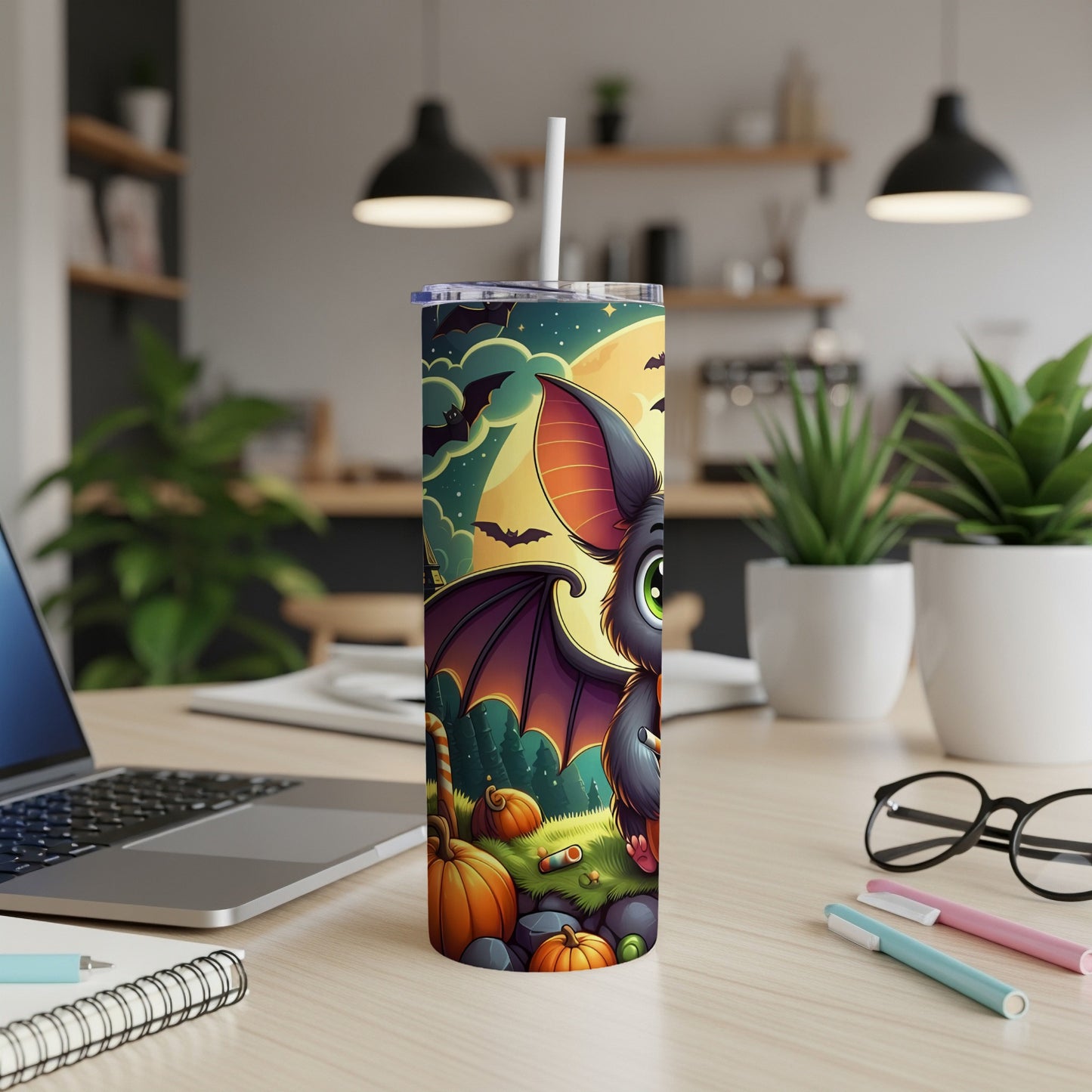 Tall tumbler with a Halloween bat, pumpkins, and bats against a moonlit sky.