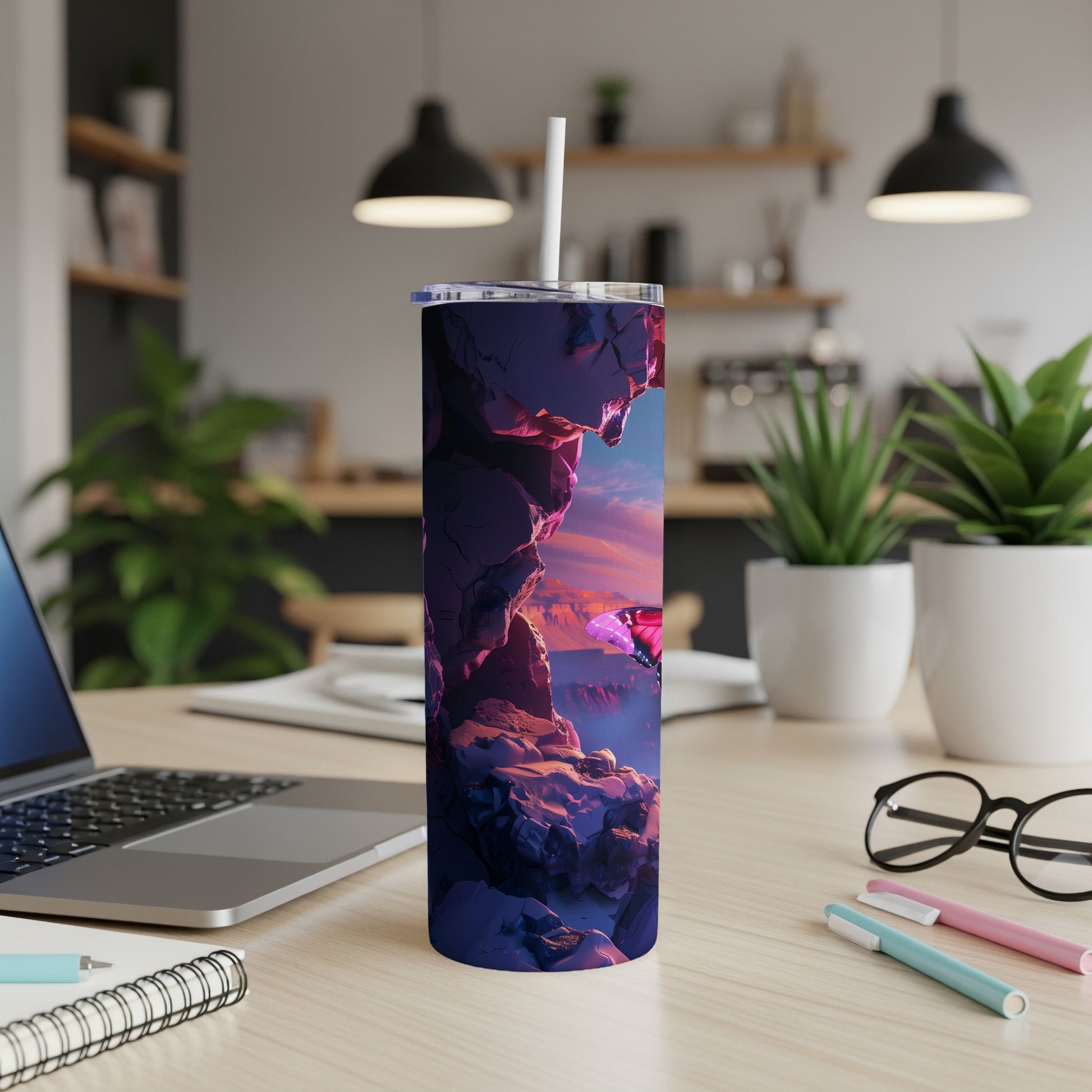 Purple tumbler with glowing butterfly on a rocky cliff at sunset.