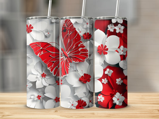 Three tumblers with red butterflies and white floral designs.