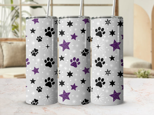 Gray tumbler with purple paw prints and glitter stars pattern.