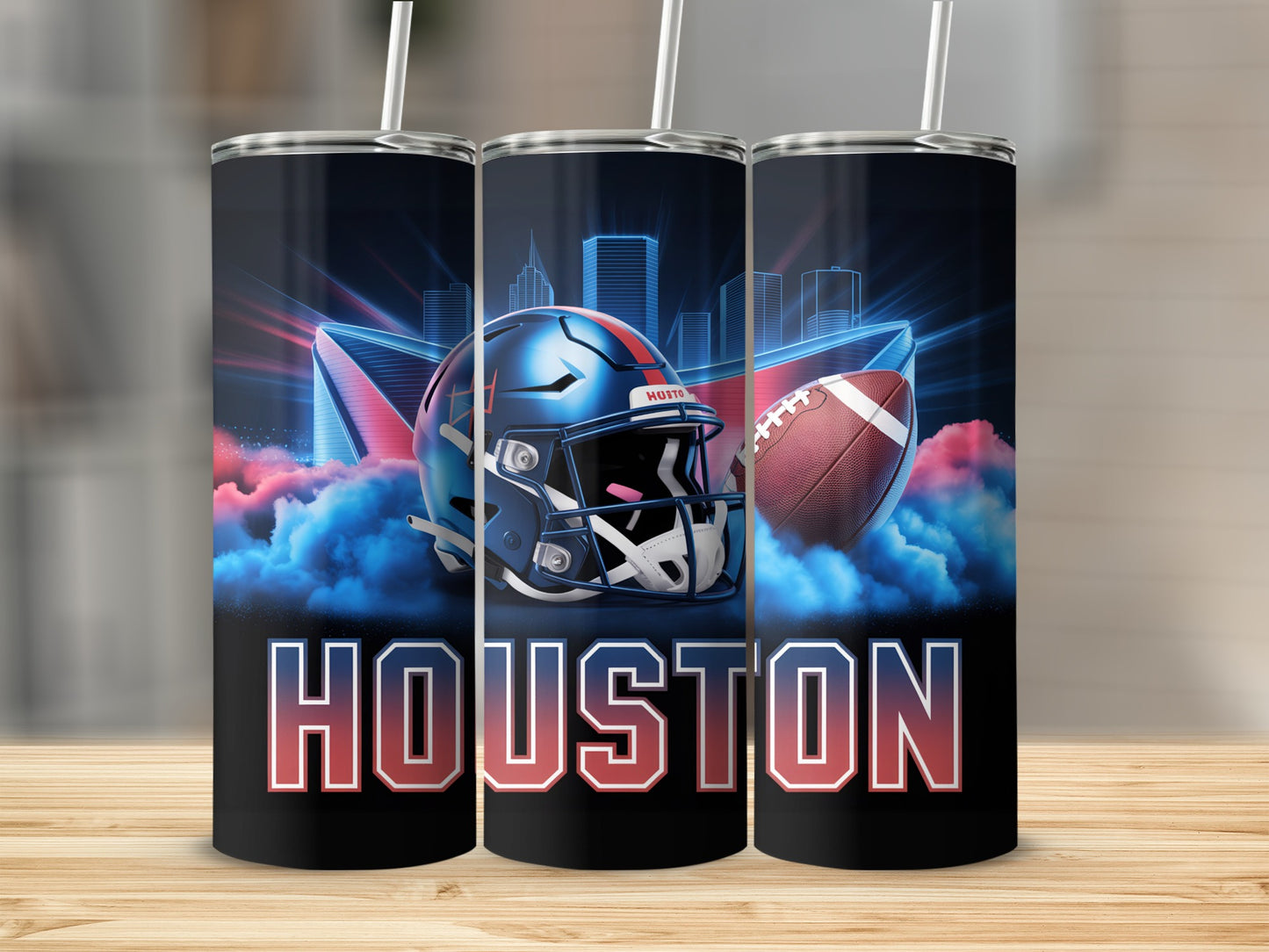 Houston football helmet, ball, and city skyline on a blue tumbler.