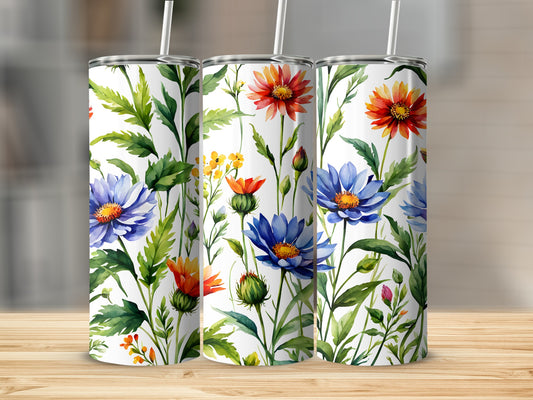 Three tumblers with a watercolor floral design of blue, orange, and red flowers.
