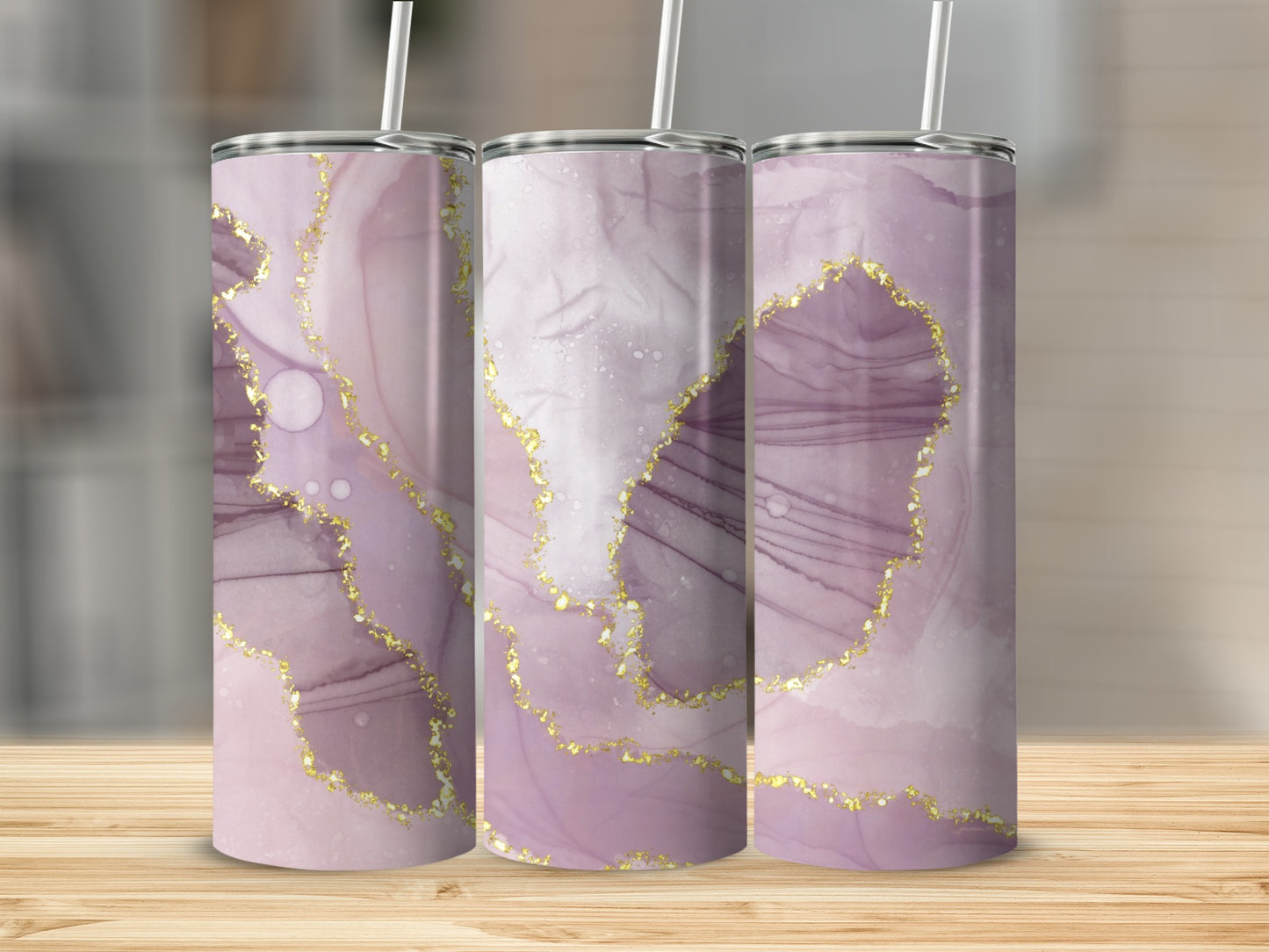 Three tumblers with marbled purple and gold abstract design.