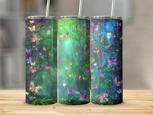 Three tumblers decorated with colorful butterflies and glowing foliage.