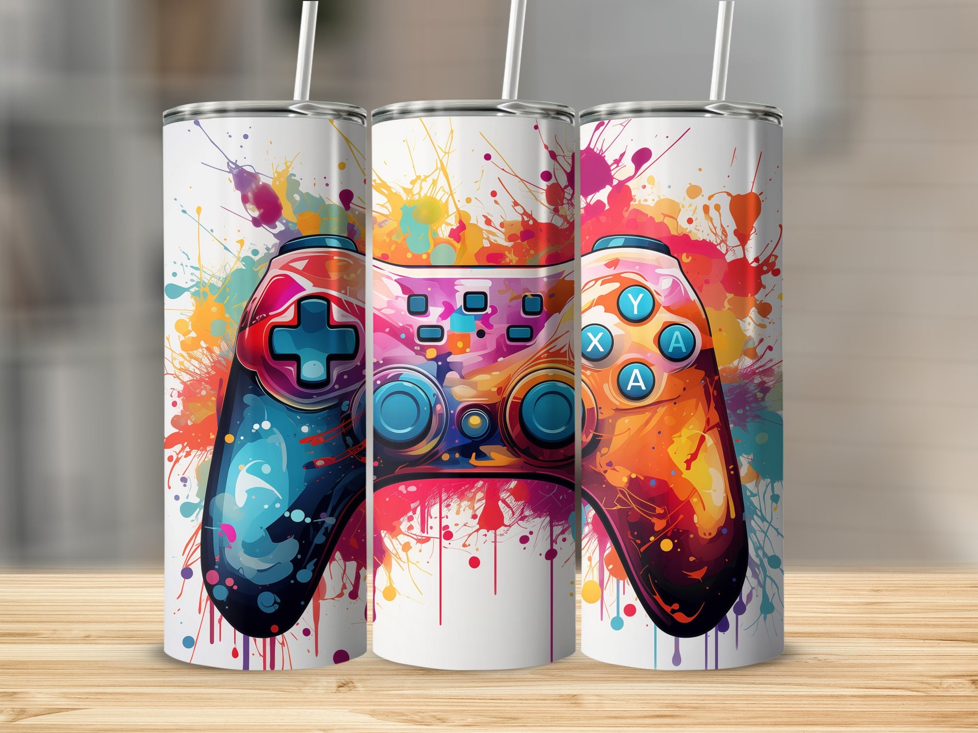 Colorful abstract paint splatter across three video game controllers.