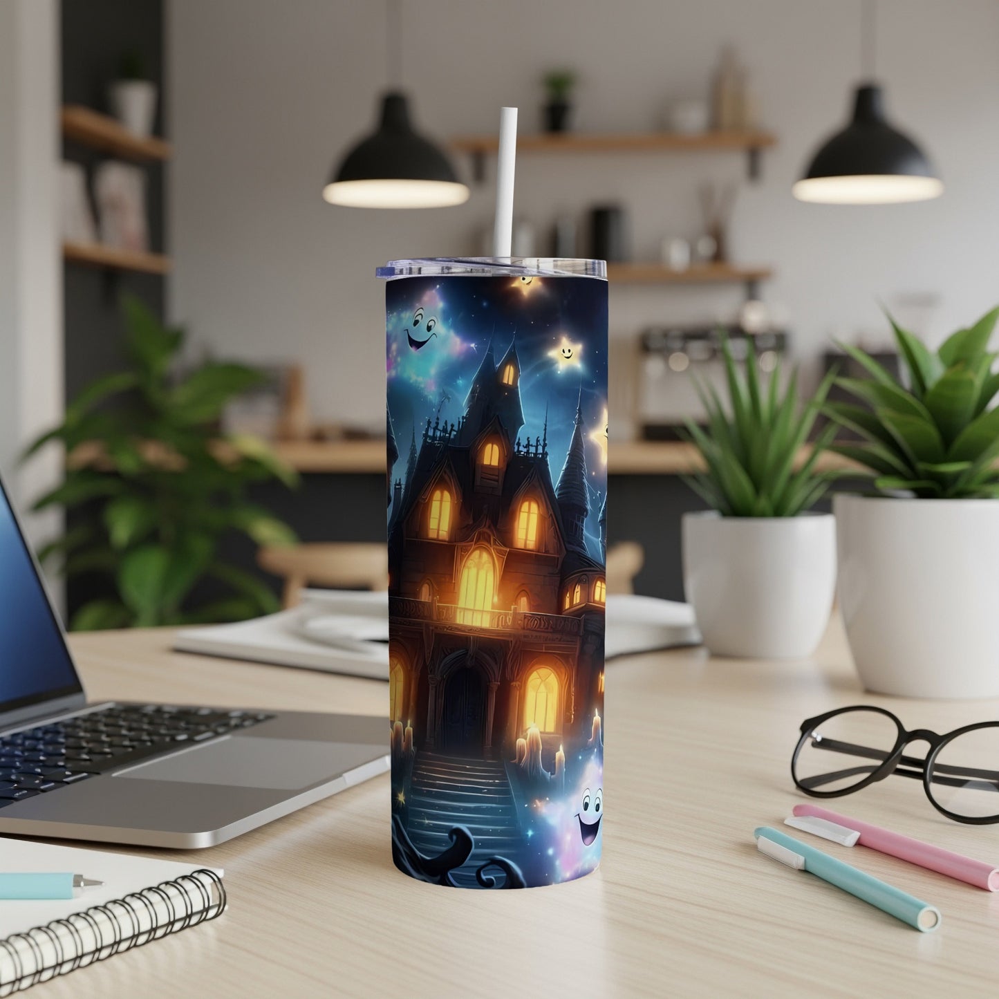 Tumbler with haunted house, ghosts, and stars design.