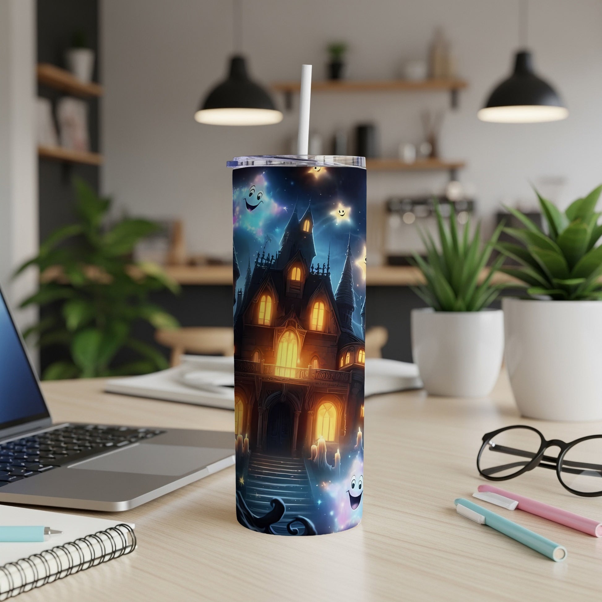 Tumbler with haunted house, ghosts, and stars design.