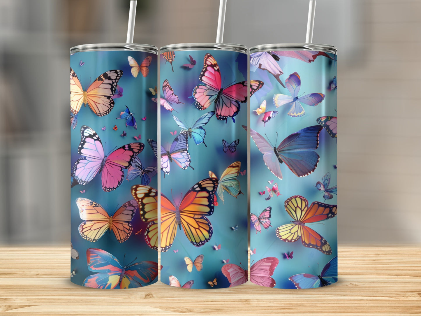 Tumbler with colorful butterfly pattern on a wooden surface.