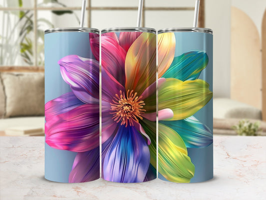 Floral tumbler with vibrant petals against a light blue background.