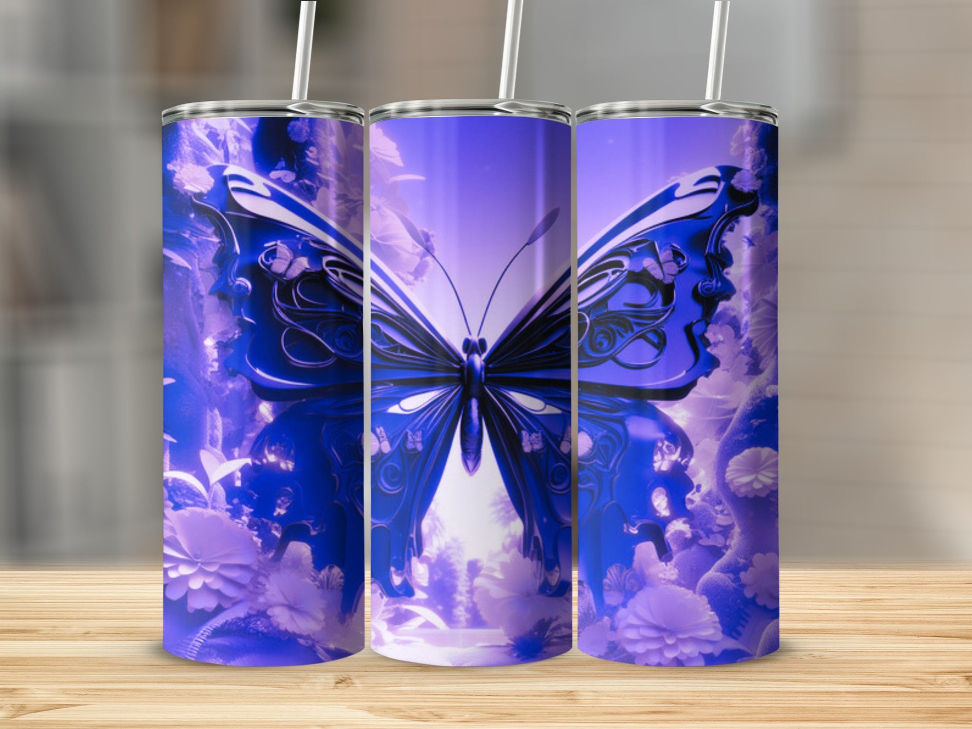 Purple butterfly and floral design on three tumblers.