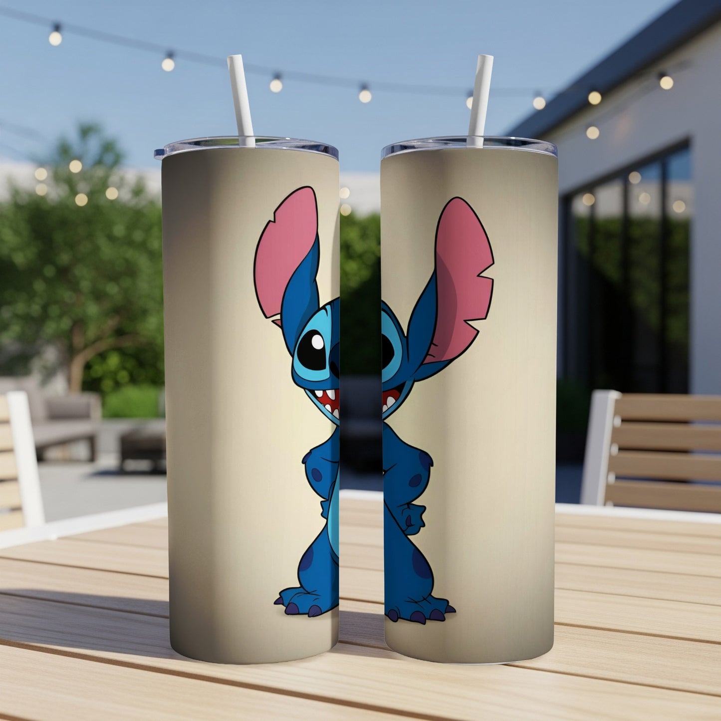 Two tumblers featuring a cartoon Stitch character in blue on a cream background.