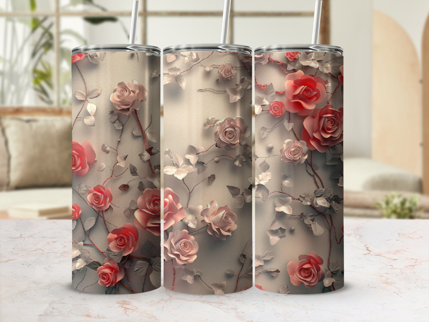 Three tumblers with a floral rose vine pattern.