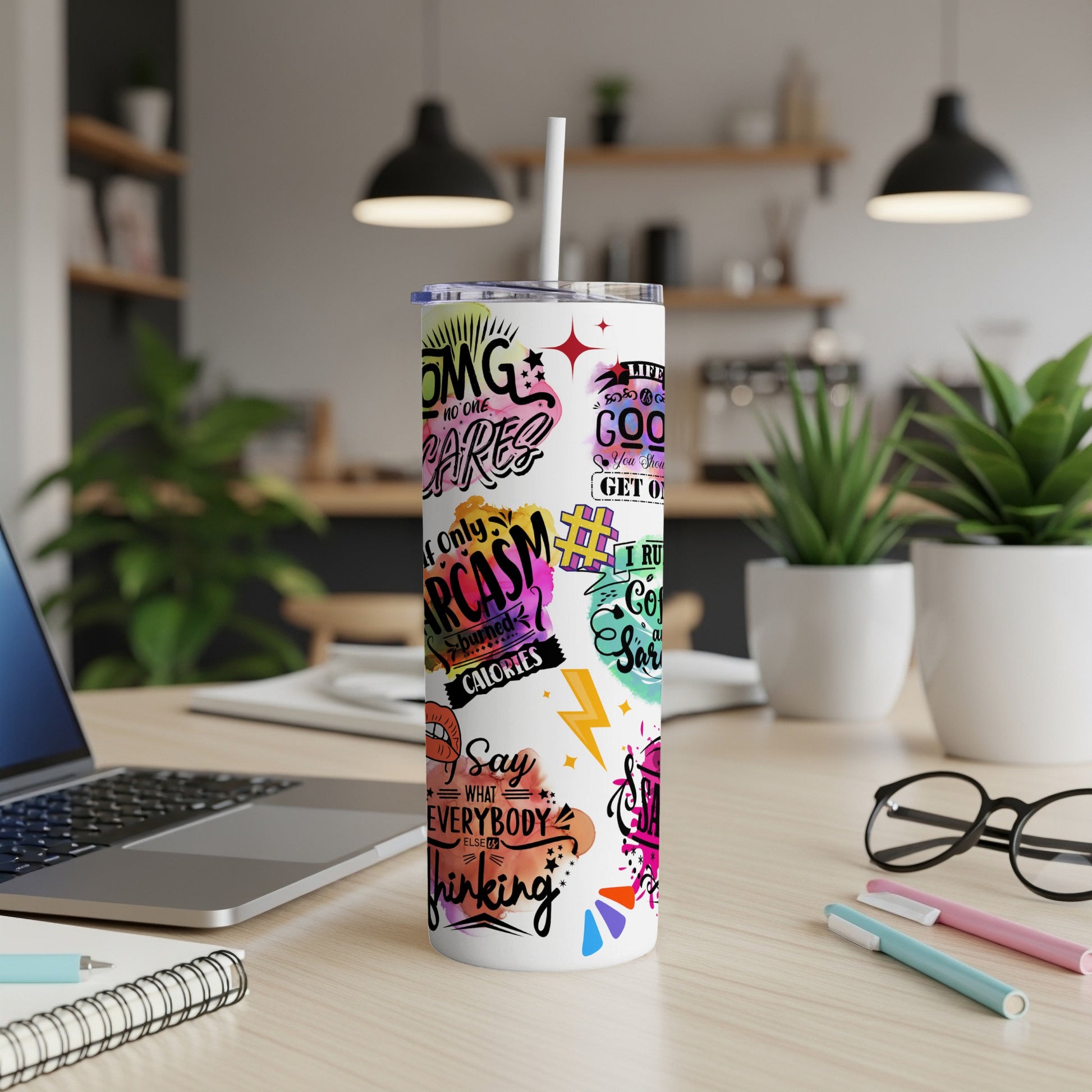 Tumbler with colorful graphics and humorous text about sarcasm and life.
