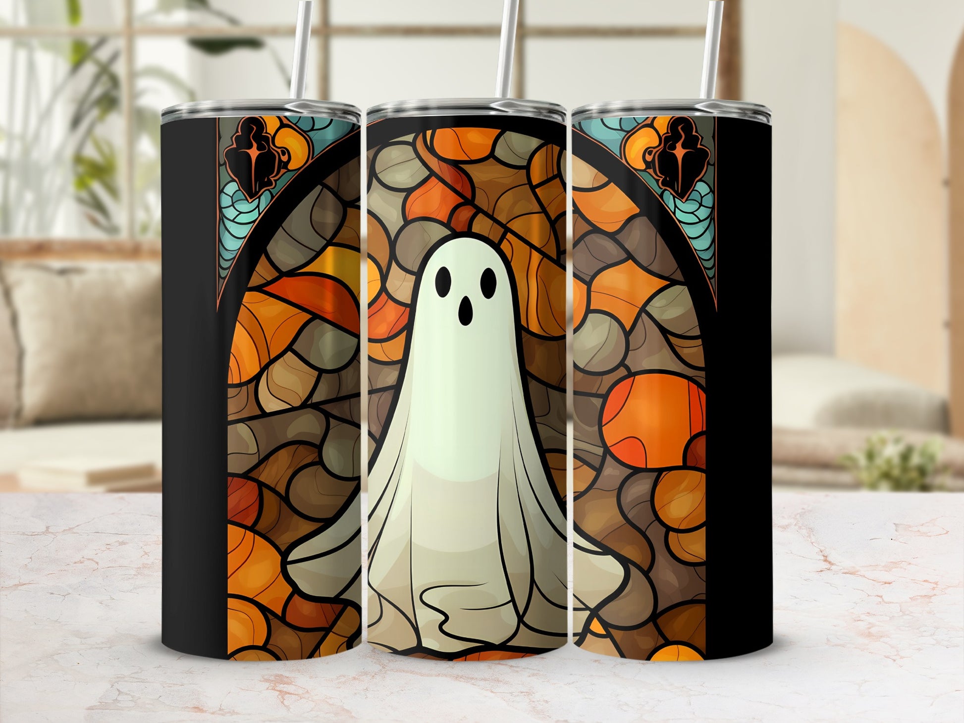 Ghost in stained glass pattern on a black tumbler with straw.