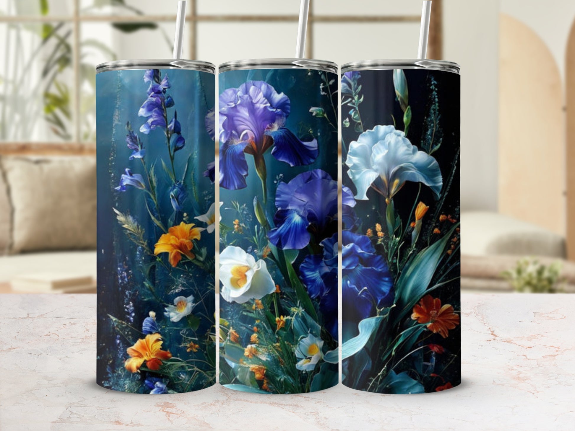 Three tumblers featuring a dark floral pattern with irises and other colorful blooms.