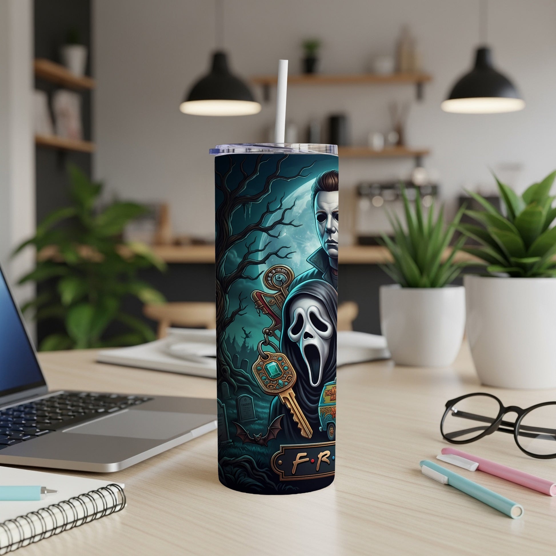Tumbler with horror characters, ghostface mask, Michael Myers, and key.