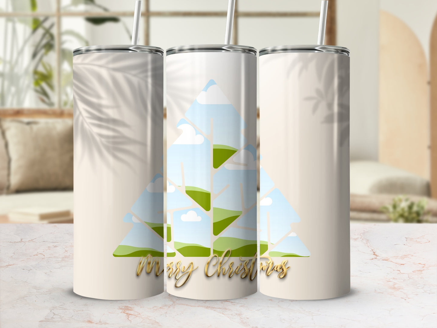 Three tumblers with "Merry Christmas" in gold lettering, featuring a collage of landscape photos forming a tree.