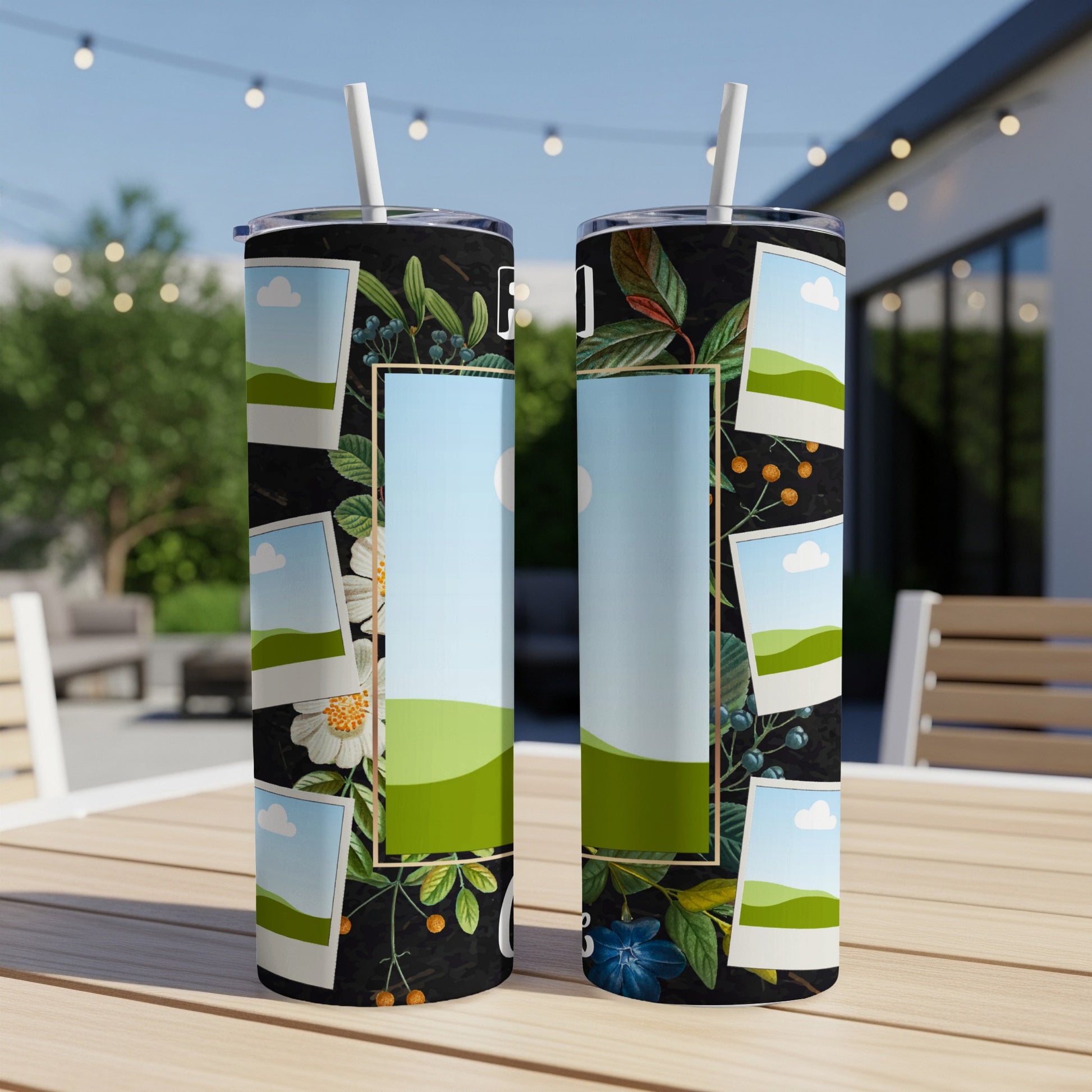 Two tumblers with a floral pattern and space for photos on a wooden table.