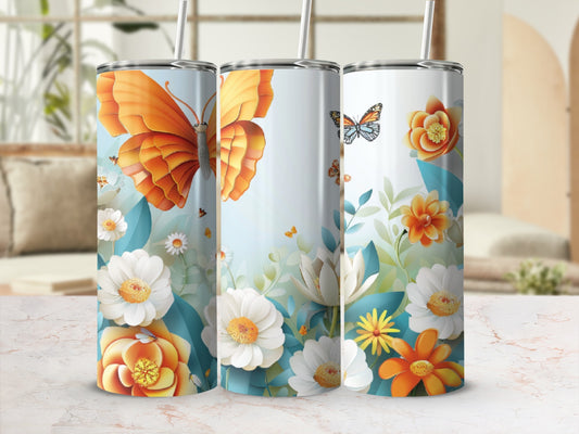 Three tumblers with orange butterfly and floral designs.