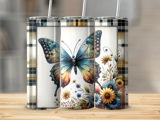 Tapered tumbler with a colorful butterfly and floral design on a plaid background.