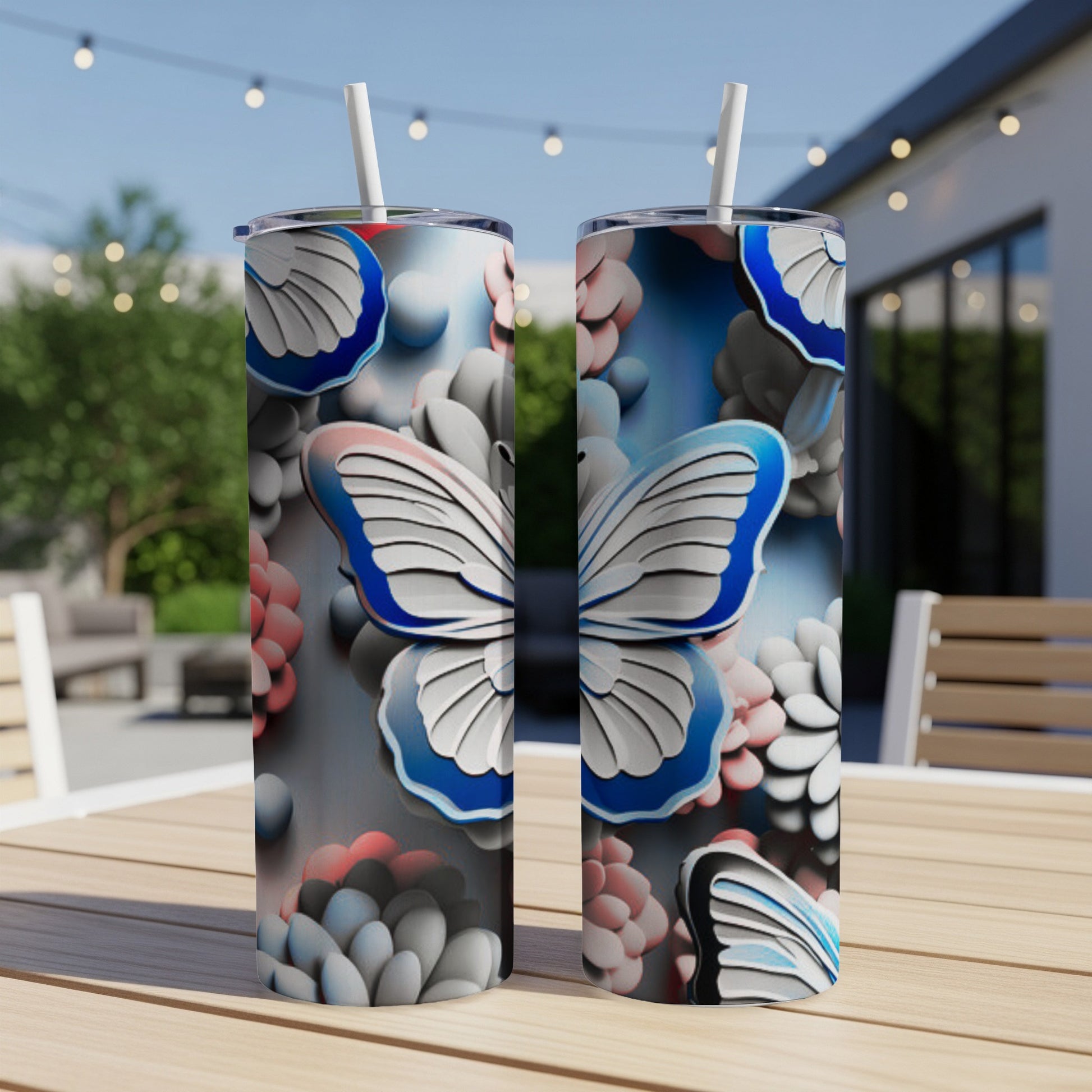 Two tumblers with a blue and white butterfly and floral design.