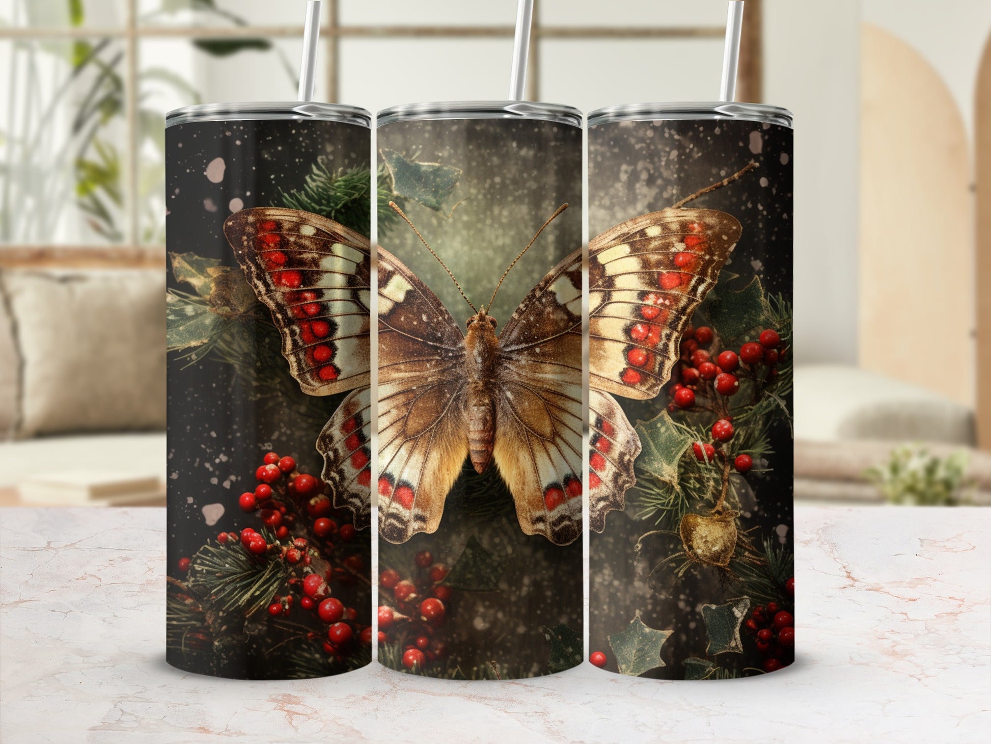 Butterfly and berries design on a set of three tumblers.
