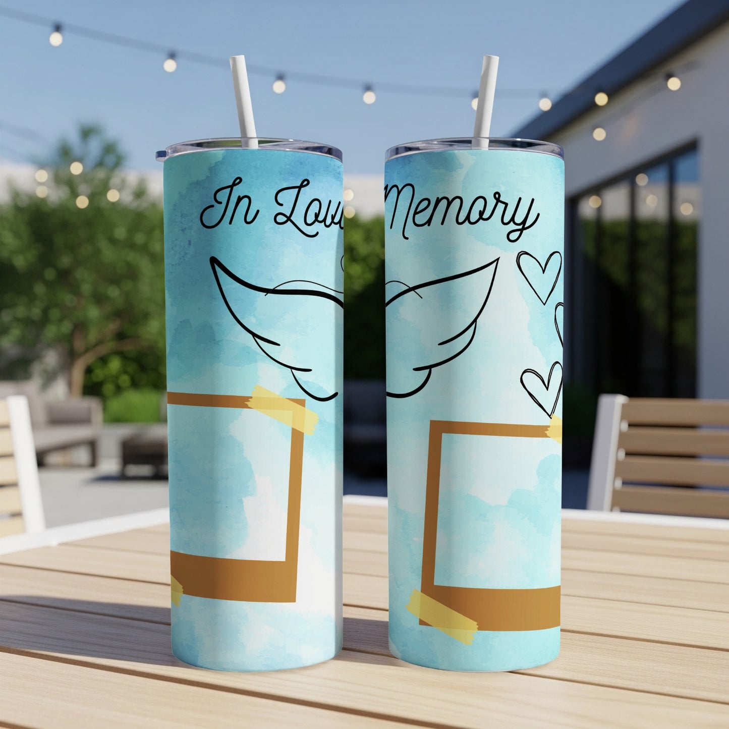 Two tumblers with "In Loving Memory" text, angel wings, hearts, and photo frames.