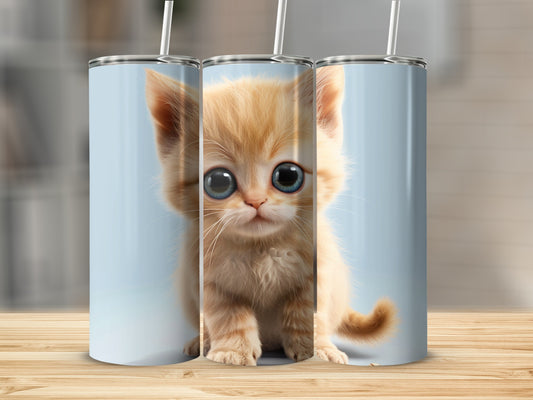 Cute orange kitten with big blue eyes on a light blue background.