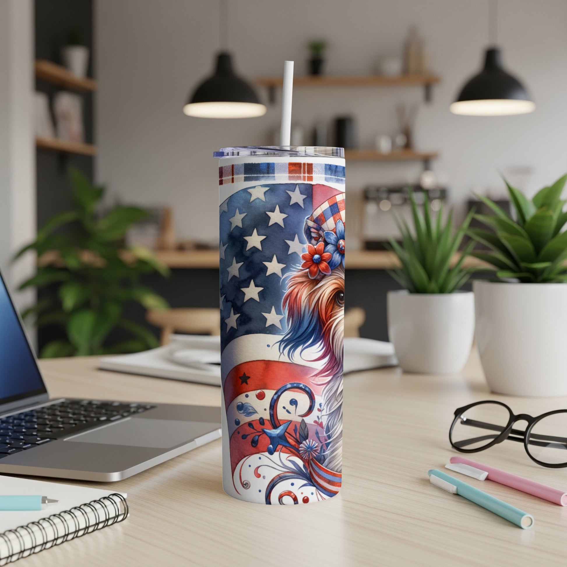 Yorkshire Terrier on patriotic tumbler with American flag design.