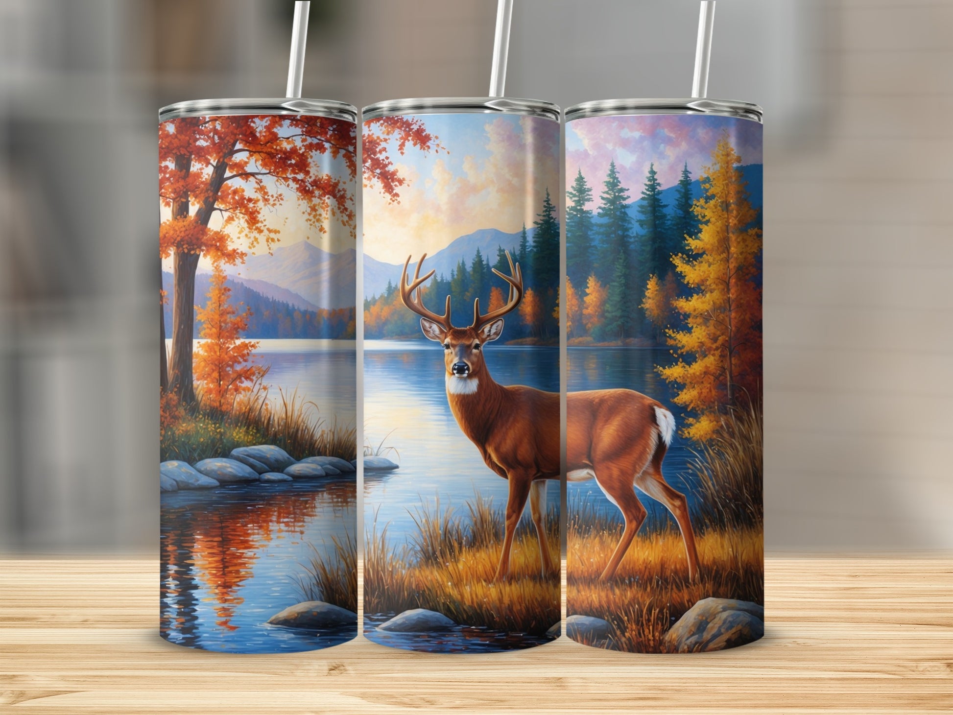 Deer by lake with autumn trees and mountains, on a tumbler.