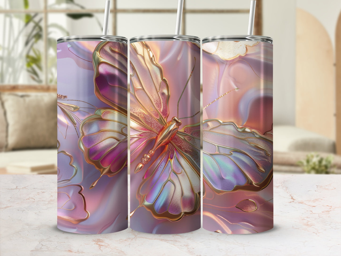 Three iridescent tumblers with butterfly and gold swirl patterns.