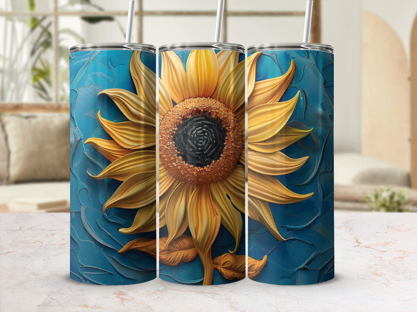 Three tumblers with a detailed sunflower design on a blue textured background.