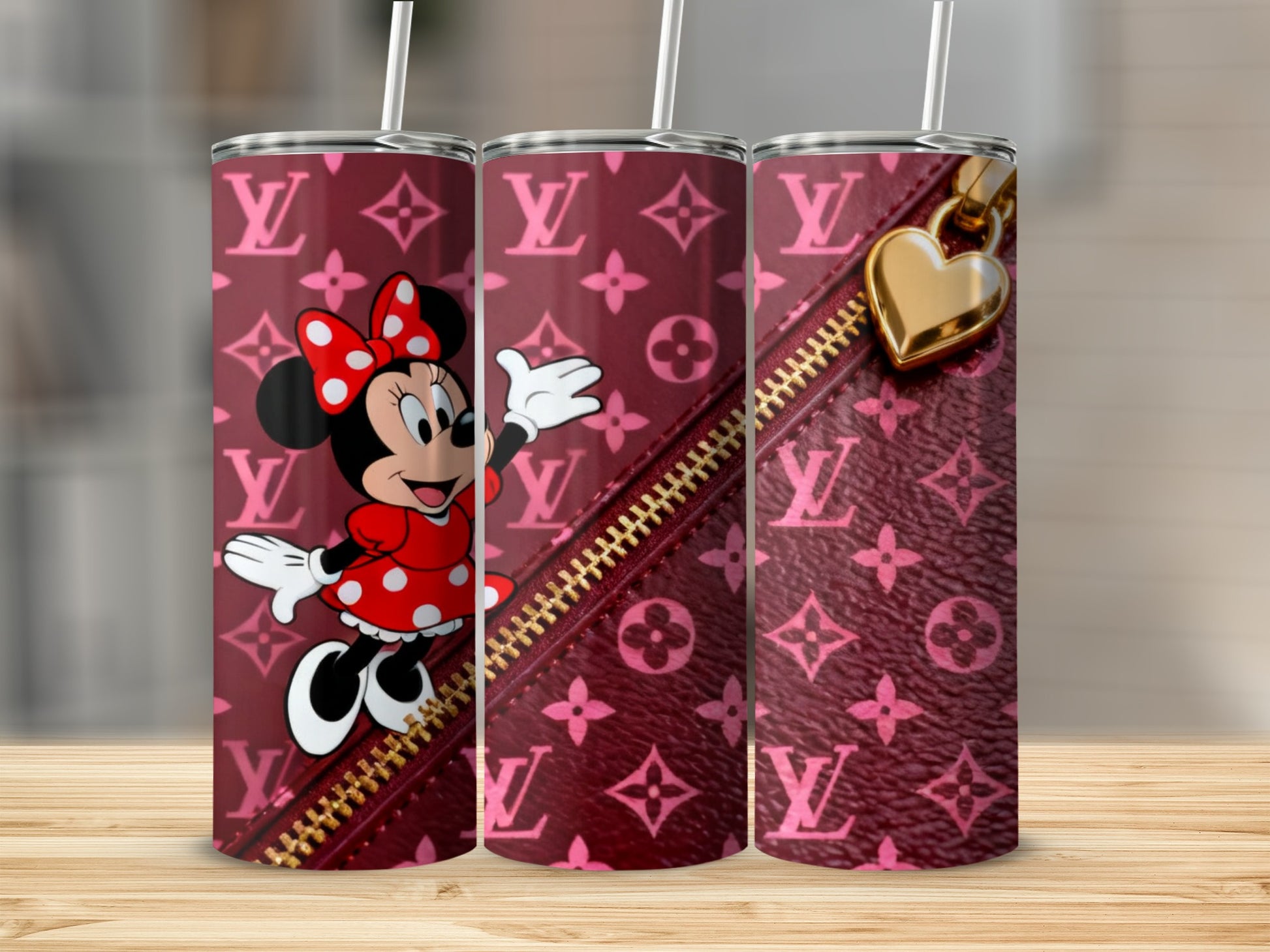 Minnie Mouse on a pink monogrammed tumbler with a gold zipper charm.