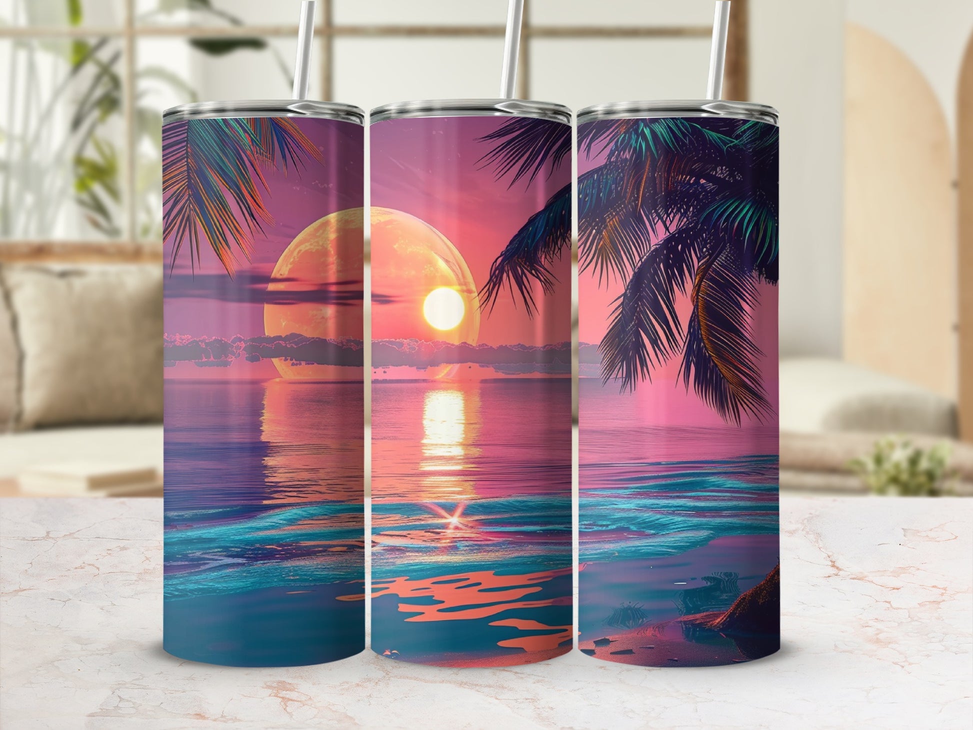 Three tumblers with a sunset ocean palm tree design.