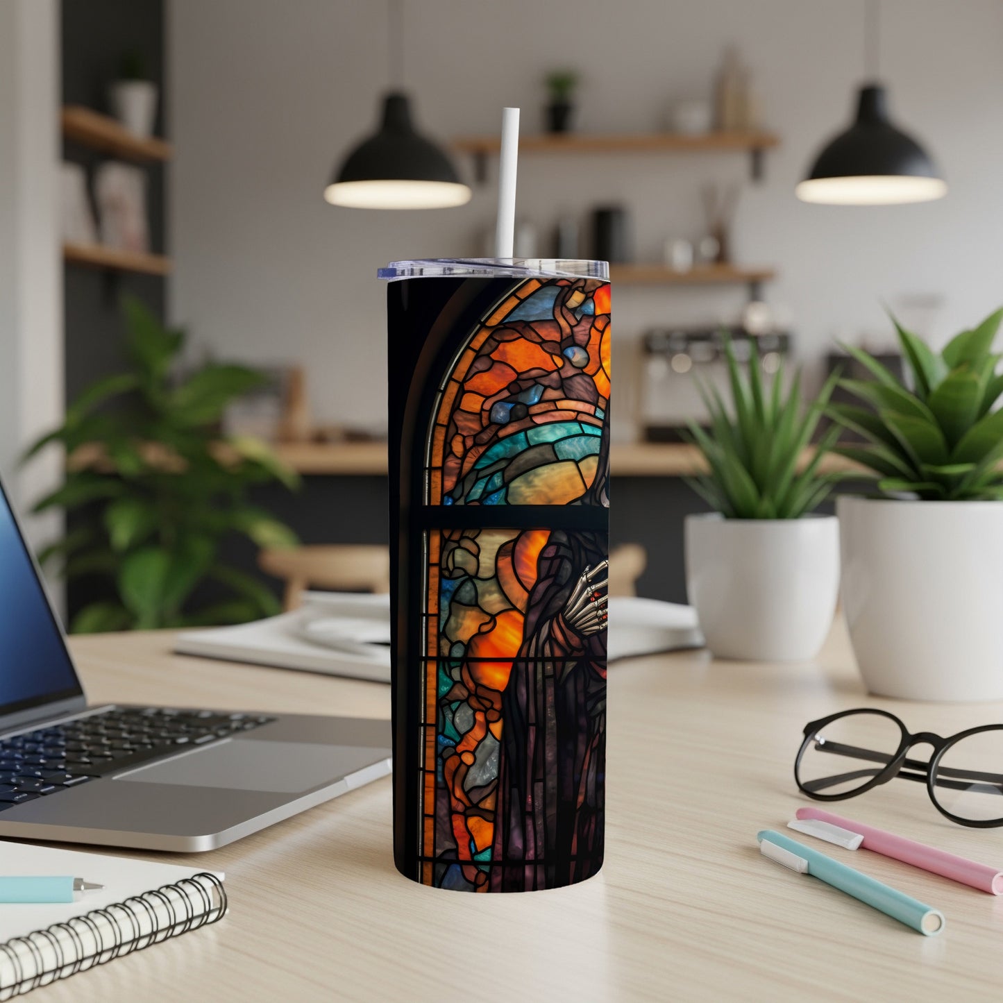 Stained glass-style tumbler featuring a dark figure against a window.