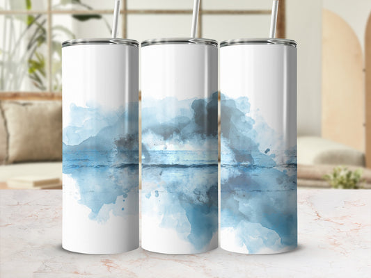 Three tumblers with a watercolor ocean sunset design.