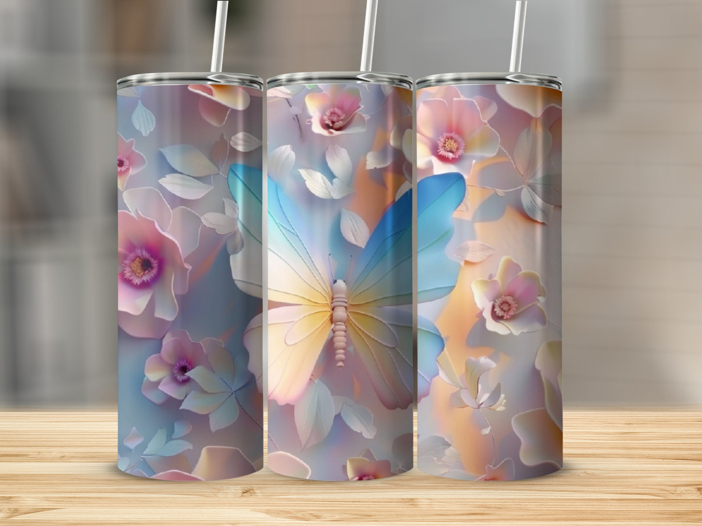 Three tumblers with a pastel butterfly and floral design.