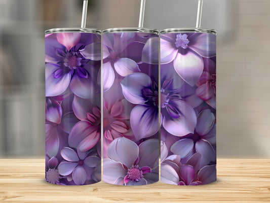 Three tumblers with a purple floral design on a wooden surface.
