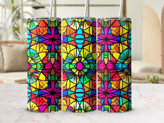 Three colorful stained-glass tumblers with geometric patterns.