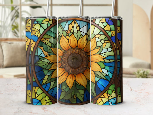 Sunflower stained glass tumbler with straw, viewed from the front.