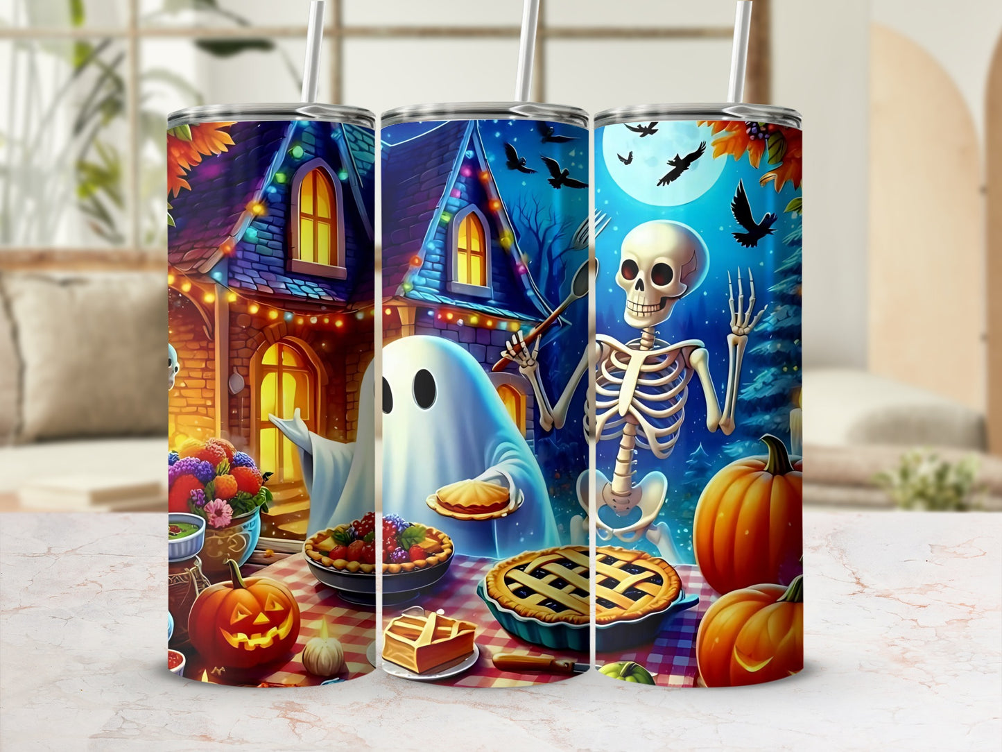 Halloween tumblers featuring a ghost, skeleton, pies, pumpkins, and a haunted house.