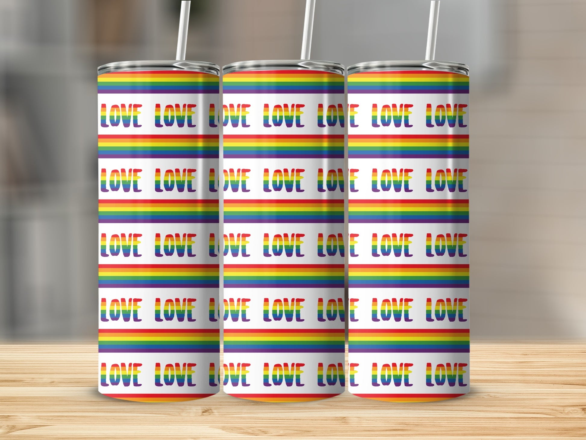Rainbow pattern tumbler with "LOVE" repeated in text.