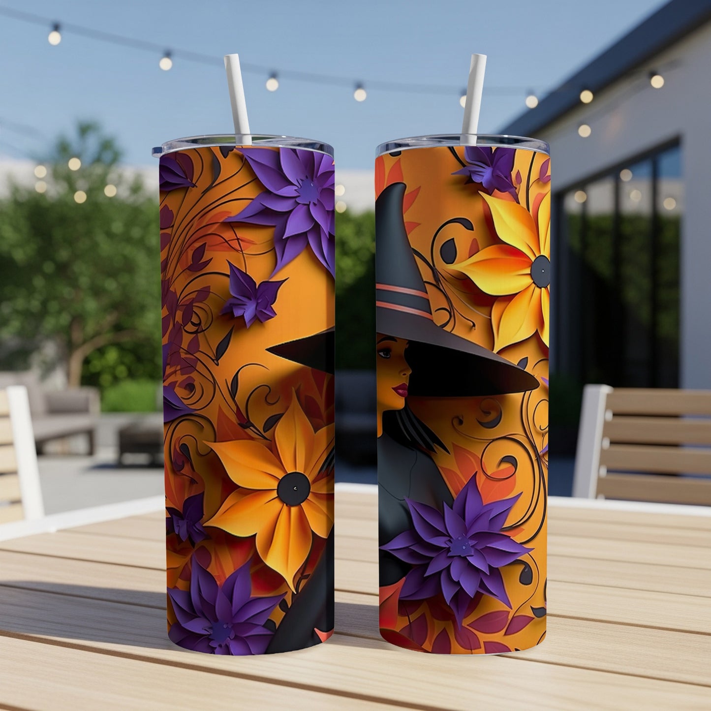 Two tumblers with a witch and floral design on an orange background.