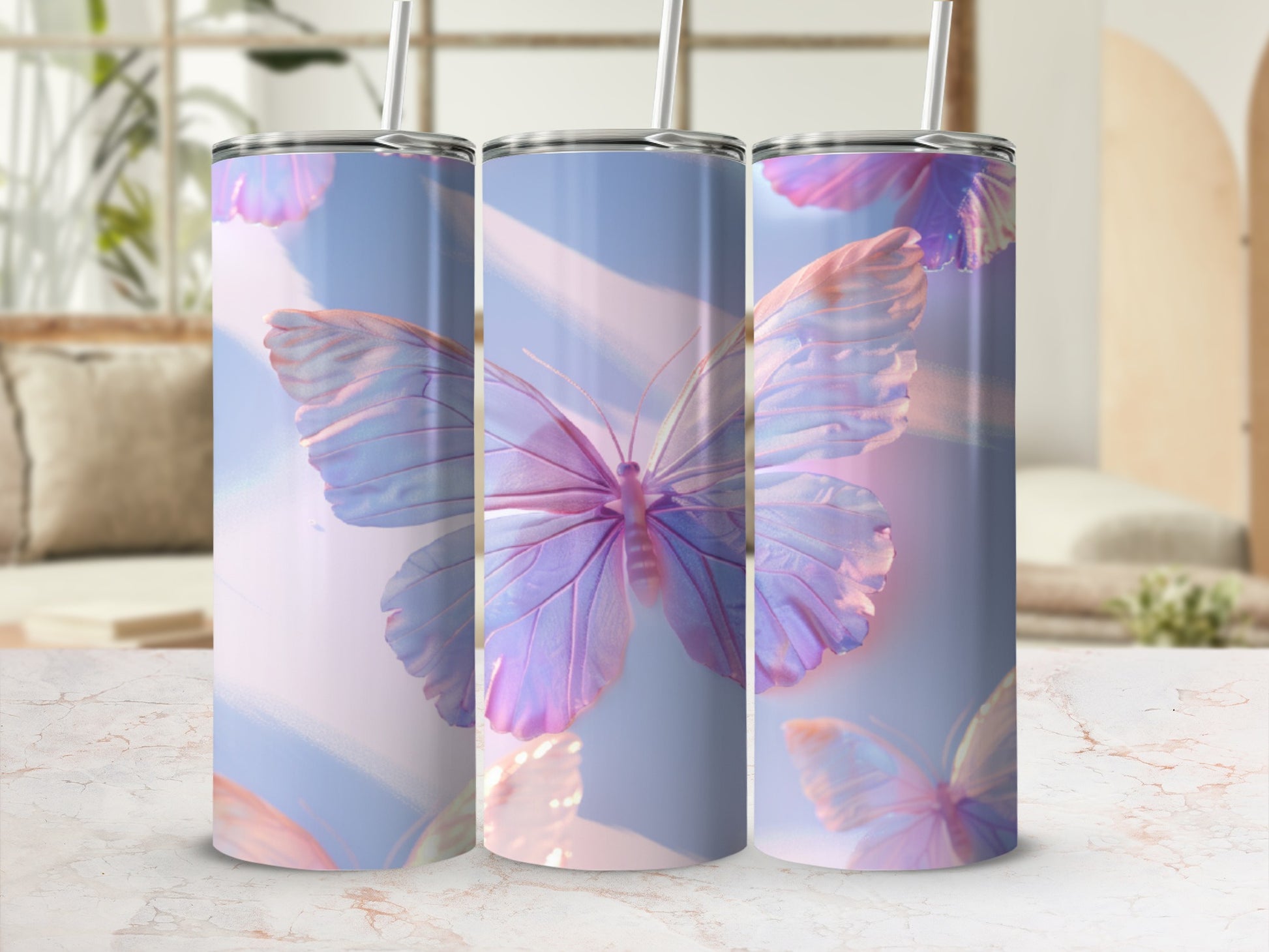 Three tumblers featuring iridescent butterflies on a pastel background.