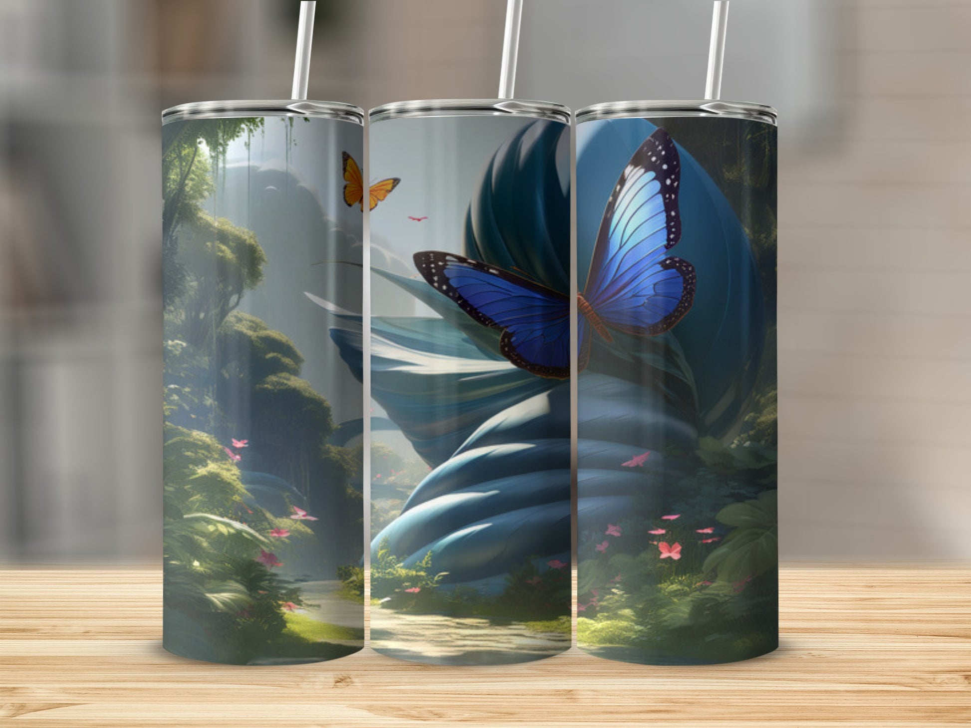 Three tumblers with a nature scene featuring a blue butterfly.
