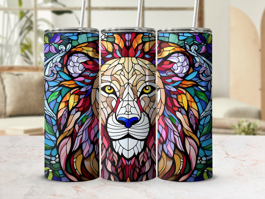 Stained glass lion head design on three tumblers with straws.