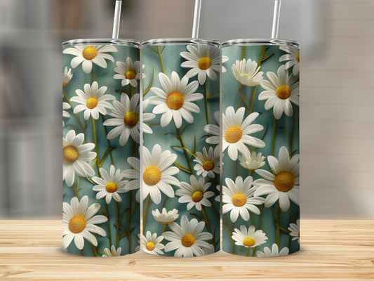 Three tumblers with a repeating daisy floral pattern.