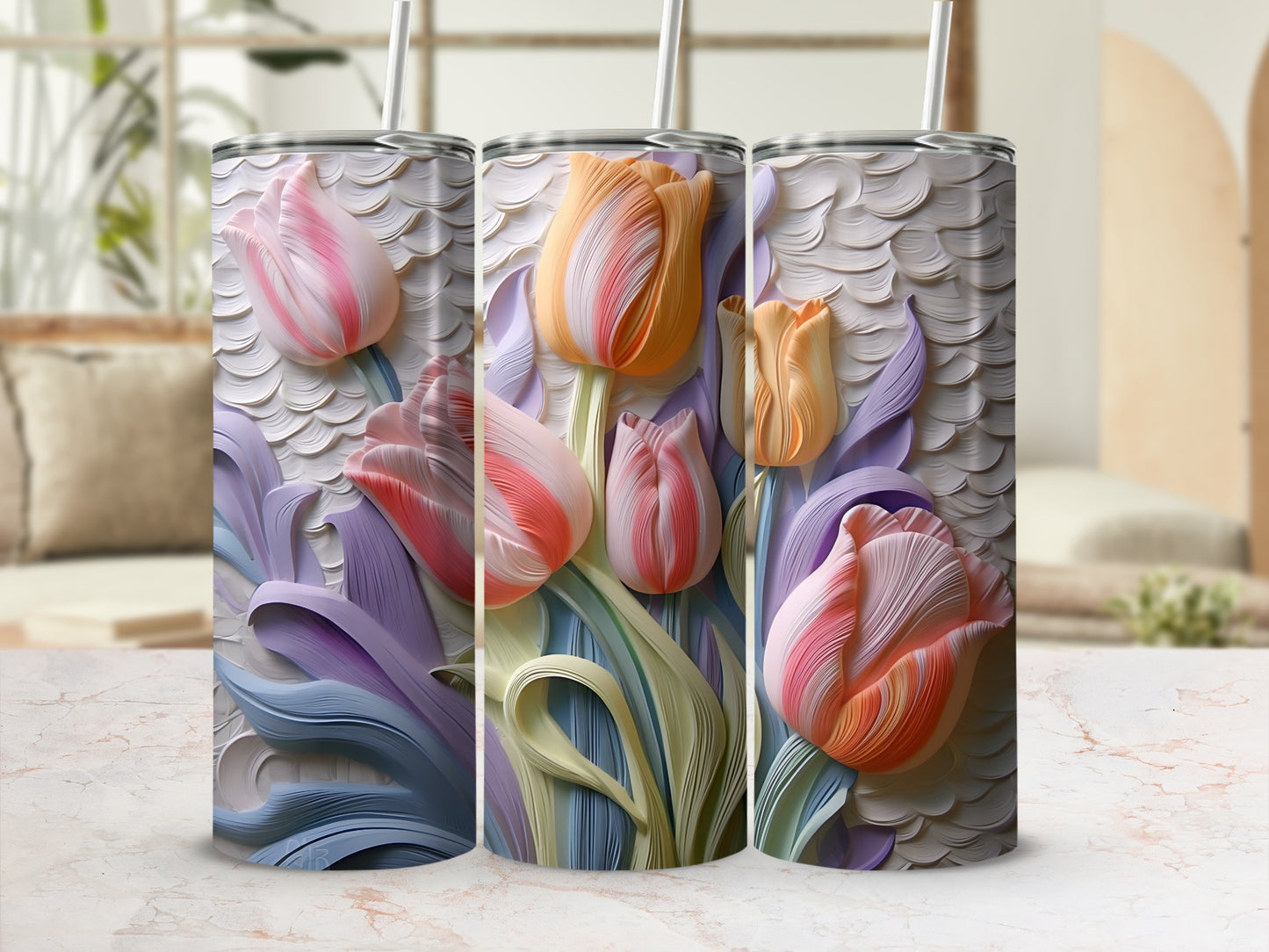 Three textured tumblers with a floral tulip design in pastel colors.